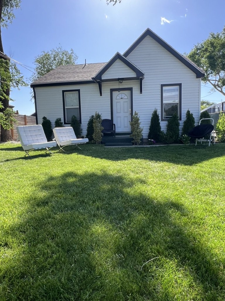 Front yard seating near House 1